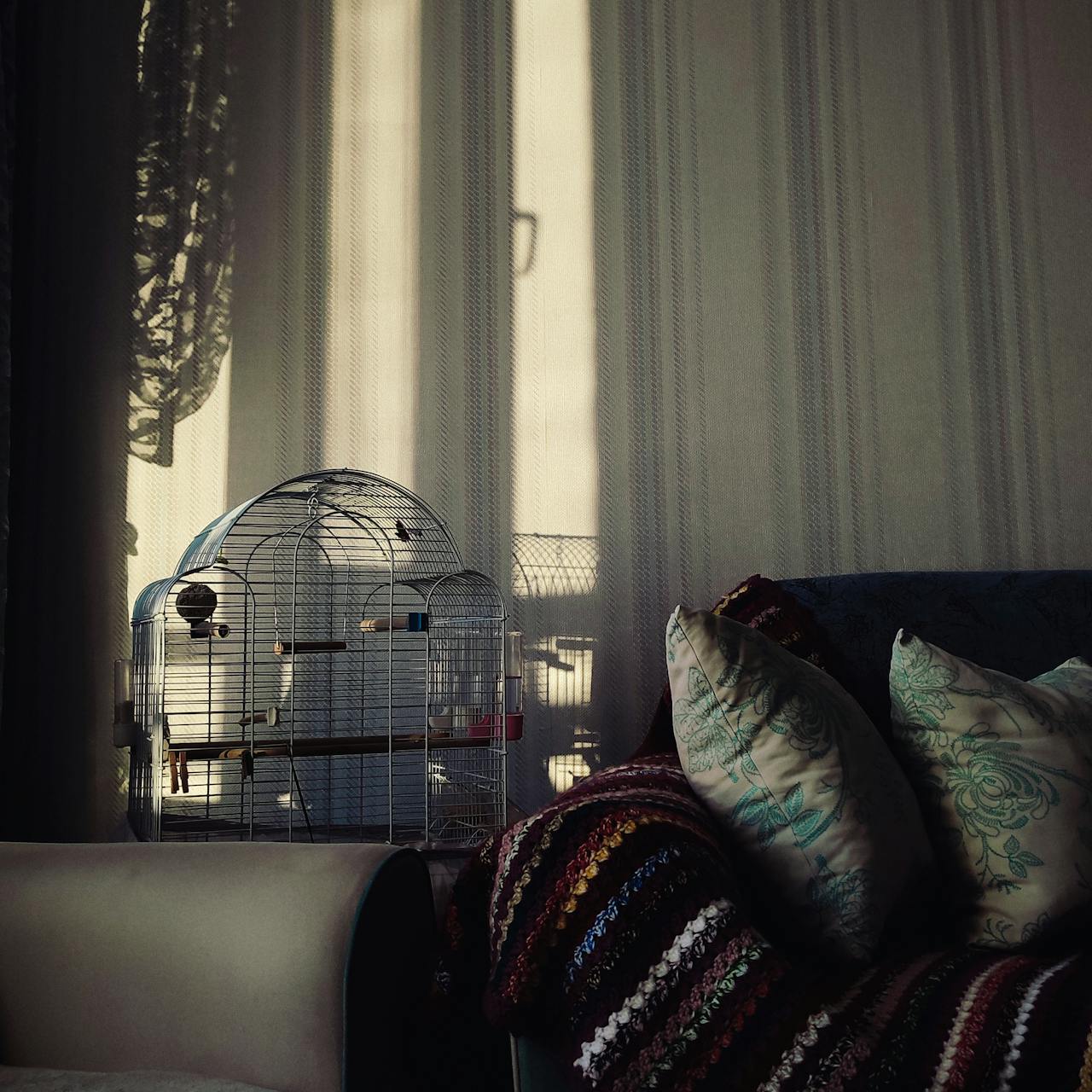 Beautiful Afghan Blanket decorative piece for couch lightens the room up